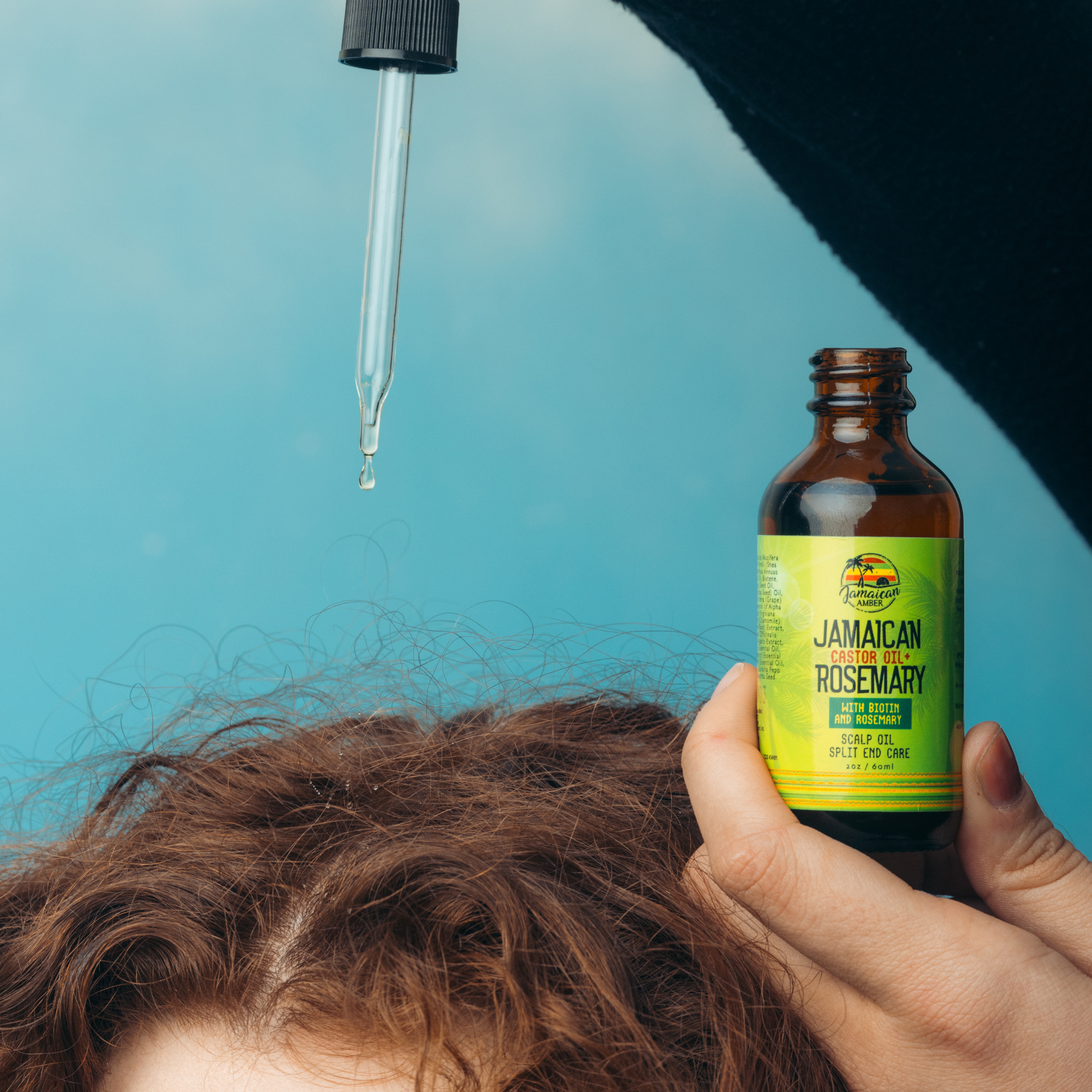 Jamaican Amber Jamaican Castor Oil & Rosemary Hair Oil  2 oz/60 ml